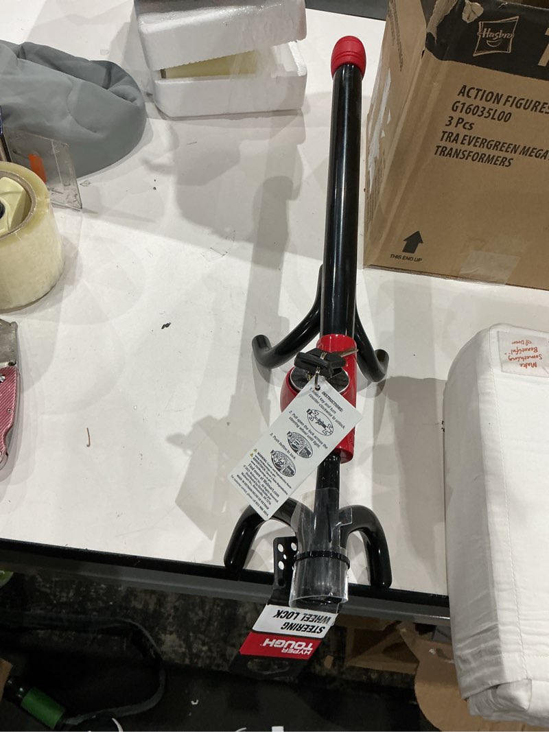 Condition photo showing Good Condition for hyper tough universal steering wheel lock anti-theft car, truck, van and suv lock, red, black