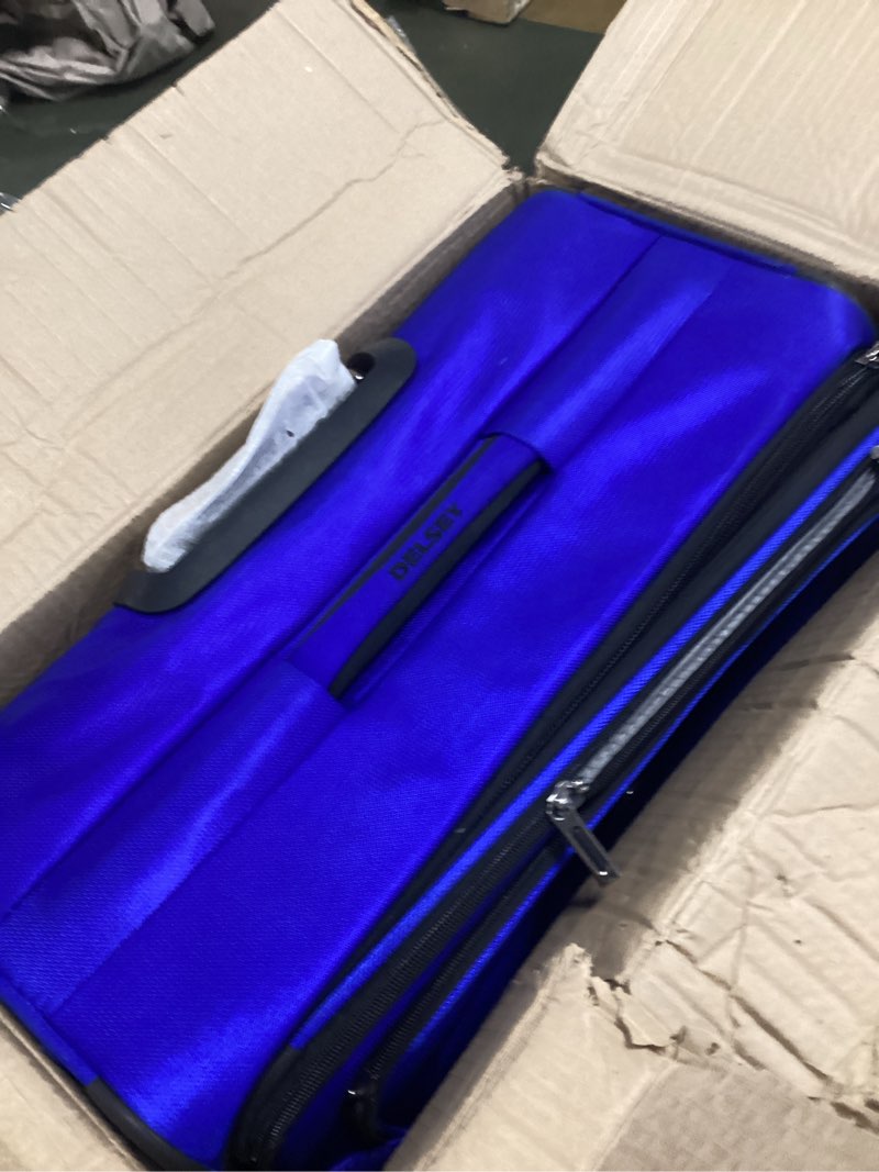 Condition photo showing As Is for SwissGear Sion Softside Expandable Luggage, Blue, Checked-Large 29-Inch Checked-Large 29-Inch Blue( similar 