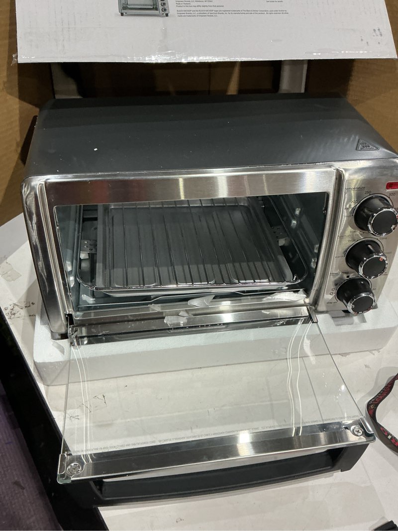 Condition photo showing As Is for black+decker 4-slice 450 w black toaster oven