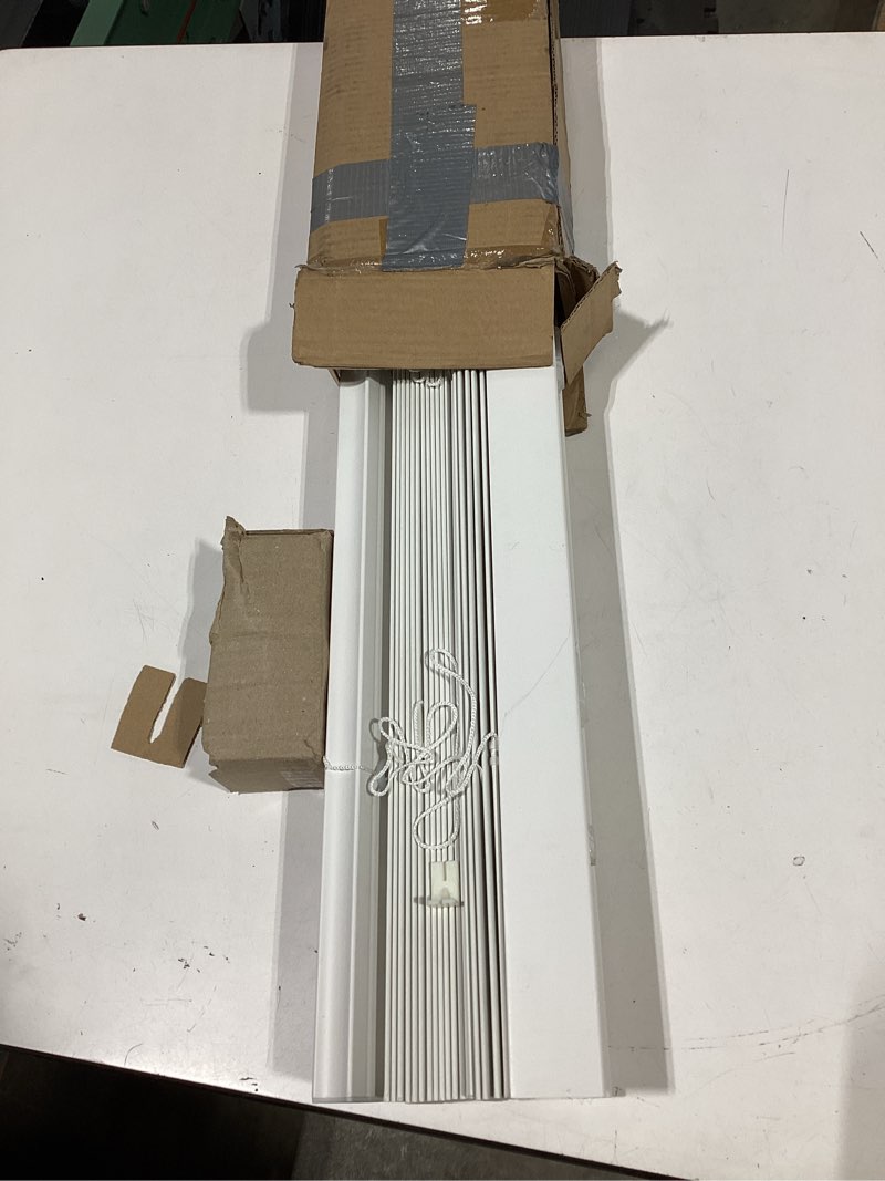 Condition photo showing Good Condition for cordless light filtering mini blind, 27 x 64 in, pearl white | cordless lift and light-filtering control: slat-based blind construction with adjustable light control.