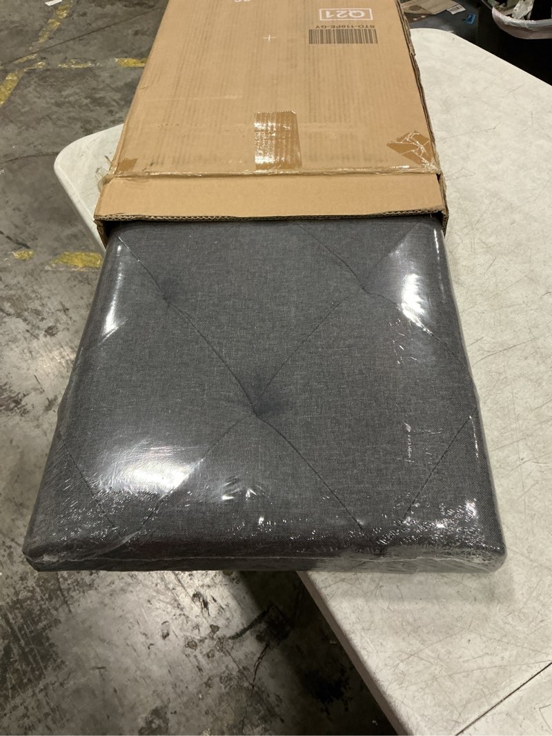 Condition photo showing New/Like New for songmics mazie collection - 43 inches folding storage ottoman bench, ottoman foot rest, end of bed bench, storage chest, load 660 lb, for living room, bedroom, entryway, dark gray ulsf77k dark gray 15"d x 43"w x 15"h