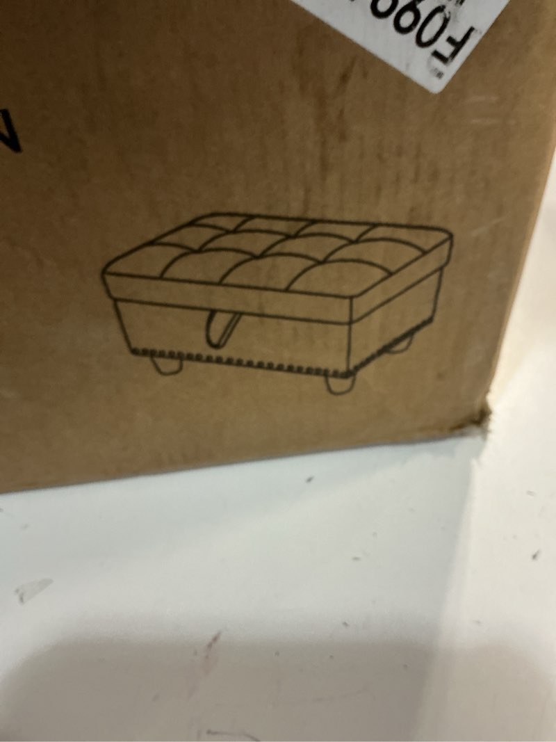 Condition photo showing item condition for Ulanda 28.5'' Wide Rectangle Nailhead Trim Storage Ottoman