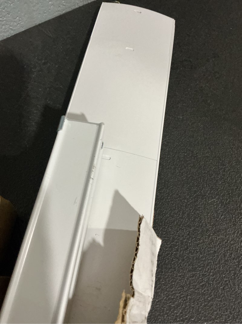 Condition photo showing As Is for project source room darkening vertical 3.5-in slat width 78-in x 84-in cordless white vinyl room darkening vertical blinds
