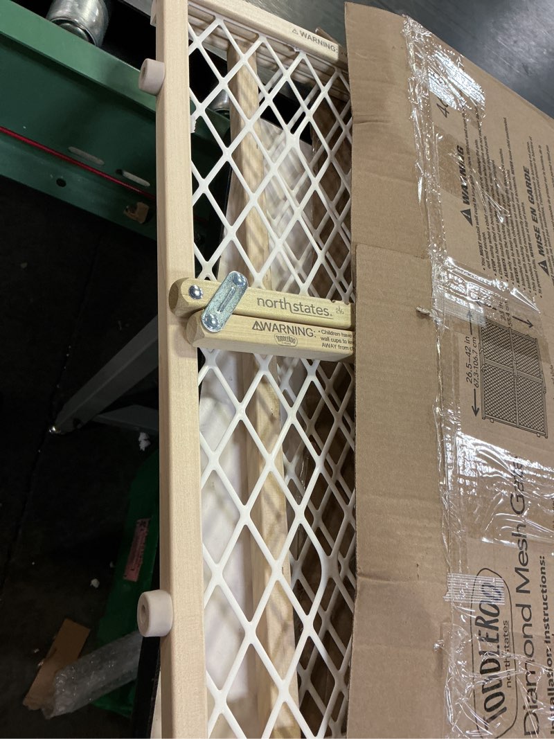 Condition photo showing As Is for toddleroo by north states - diamond mesh wooden baby gate: pressure mounted baby gate for doorways - adjustable 26.5 to 42 inches wide - 23 inches tall