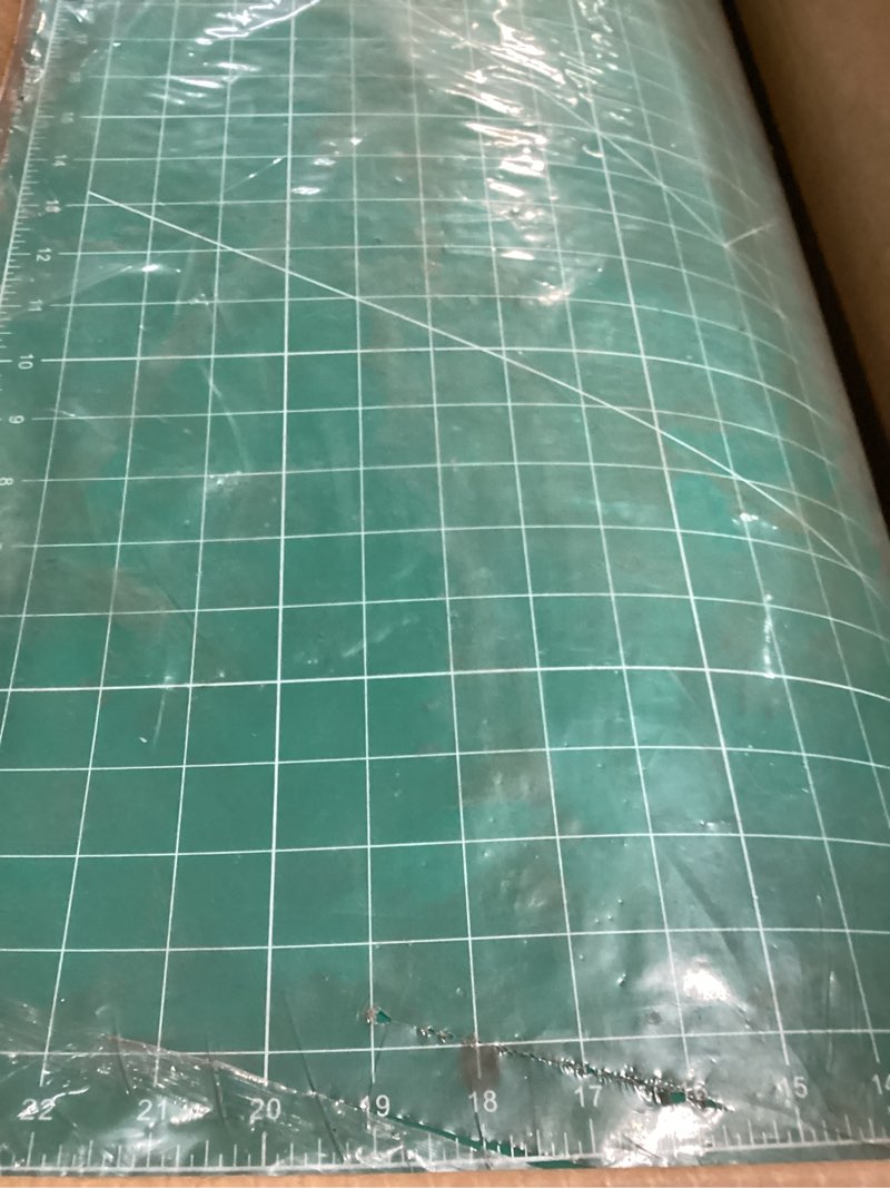 Condition photo showing As Is for WORKLION 24" x 36" Large Self Healing PVC Cutting Mat, Double Sided, Gridded Rotary Cutting Board for Craft, Fabric, Quilting, Sewing, Scrapbooking - Art Project… 36"L x 24"W Green/Blue