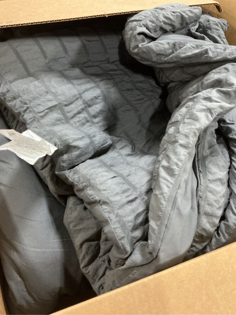 Condition photo showing As Is for grey comforter set