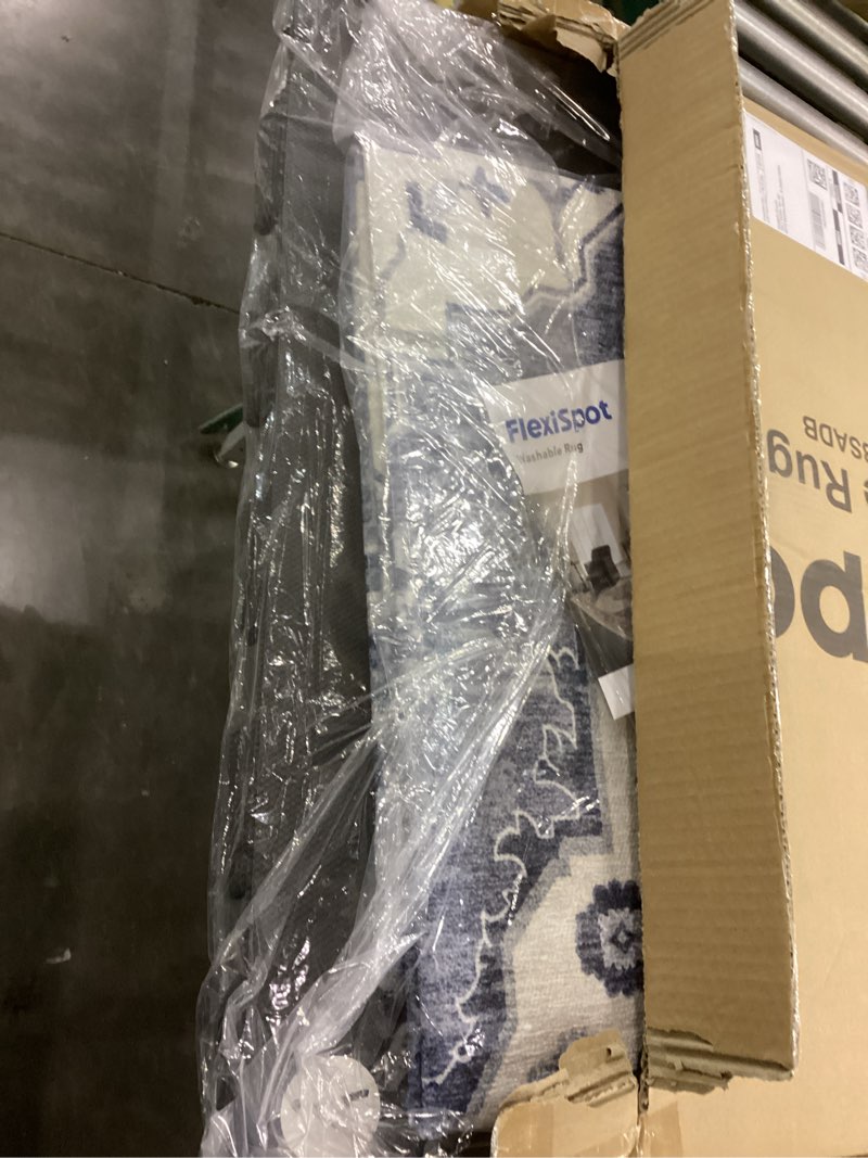 Condition photo showing New/Like New for Washable rug