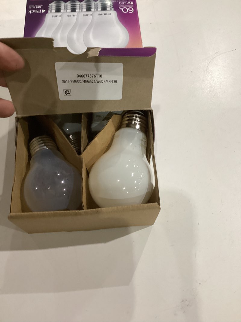 Condition photo showing As Is for philips led 60w a19 4-pack ultra definition soft white (2200k) 800 lumen (8w=60w) dimmable flicker free light bulbs soft white (2700k) 4 pack 60w