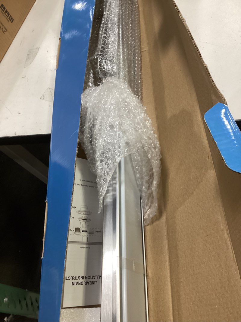 Condition photo showing Good Condition for SaniteModar Linear Shower Drain, Shower Drain 54 inch with Flat & Tile Insert 2 in 1 Panel, Brushed 304 Stainless Steel Linear Drain with Hair Strainer and Leveling feet Tile Insert Grate 54 inch