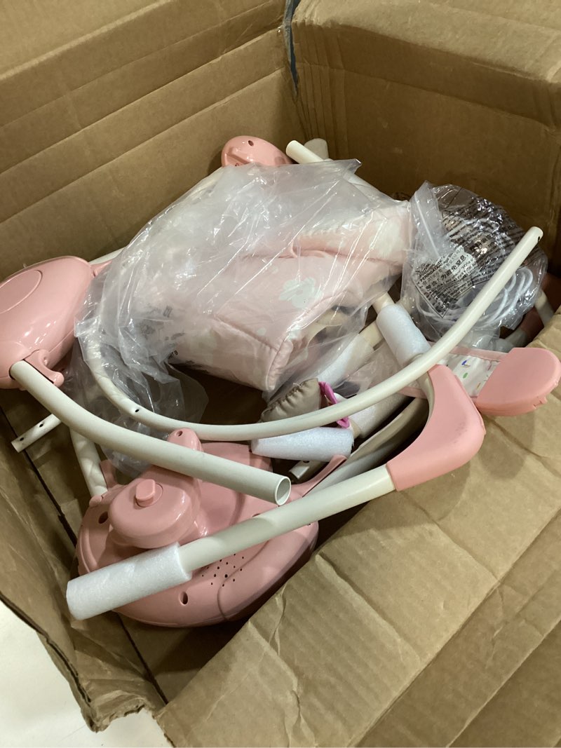 Condition photo showing As Is for baby swings for infants, tiny marvels foldable swing with music,0-9m, 20lbs | five swing speeds, dual power supply, five-point harness, auto shutoff timer, sensory toy bar blush bloom
