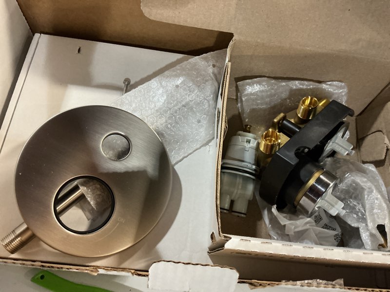 Condition photo showing As Is for delta modern 14 series round rain shower system faucet set, rainfall brushed nickel shower head and handle set, valve trim kit, 10 inch, spotshield stainless 342702-sp stainless with rough