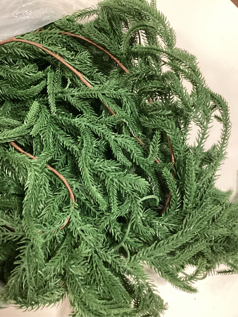 Condition photo showing As Is for 2 Pcs 9 Ft Norfolk Pine Garland, Artificial Dense Christmas Garland Ornaments, Real Touch Greenery Garland for Fireplace, Stairs, Table, Mantle, Wall, Indoor, Outdoor Christmas Decorations 9 Ft 2