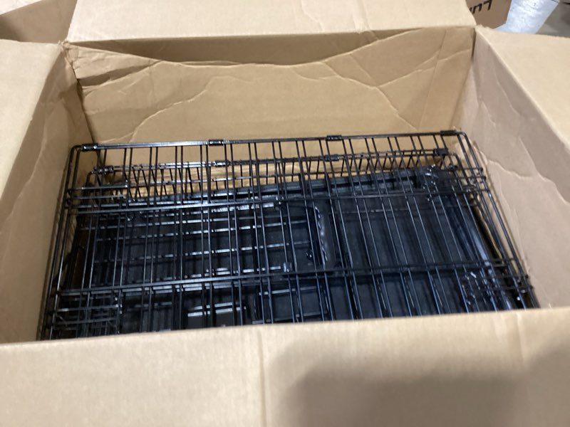Condition photo showing Good Condition for amazon basics portable, foldable metal wire dog crate with removable tray, single door, divider panel, collapsible for travel, 22 x 13 x 16 in, black 22.0"l x 13.0"w x 16.0"h single door w/ divider