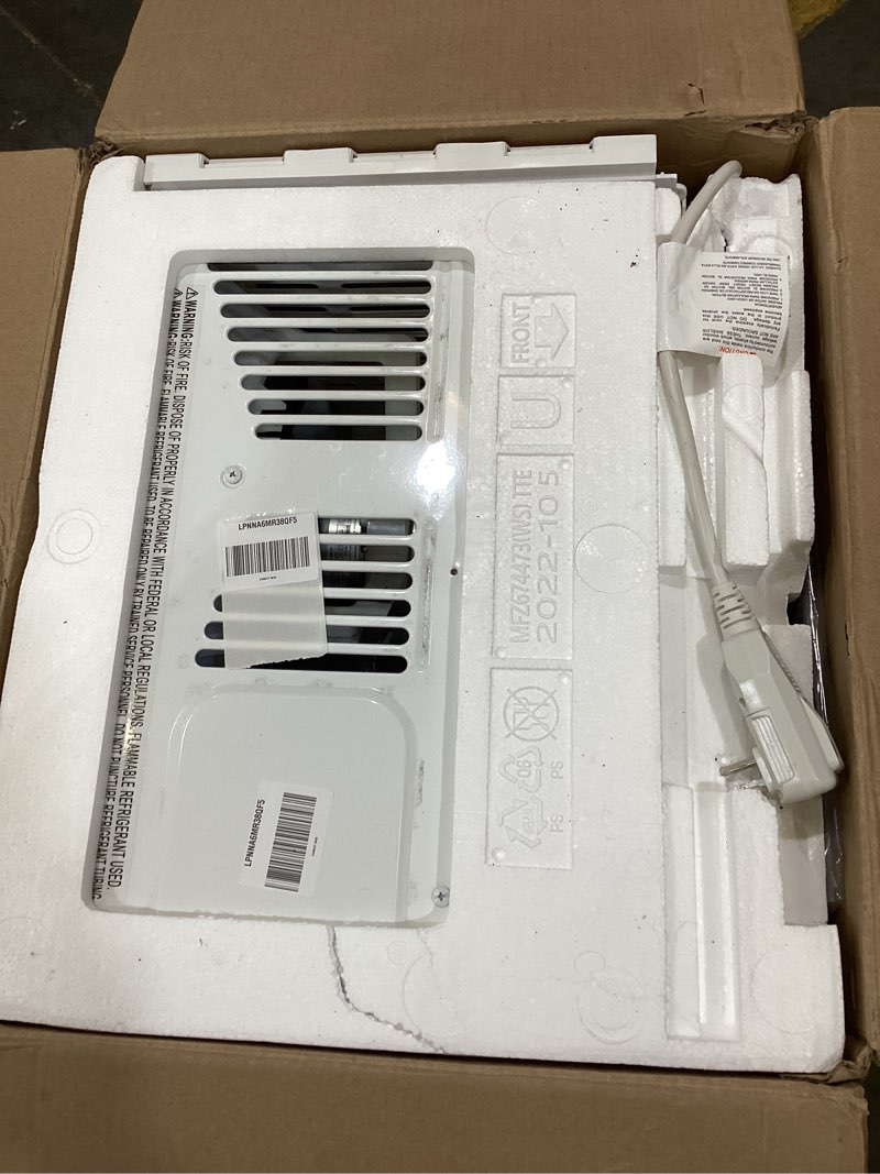 Condition photo showing As Is for lg 6,000 btu window air conditioner, 115v, cools 250 sq.ft. for bedroom, den, living room, quiet operation, with remote, 2 cooling & fan speeds, 2-way air deflection, auto restart, white 6000 btu electronic & standard white