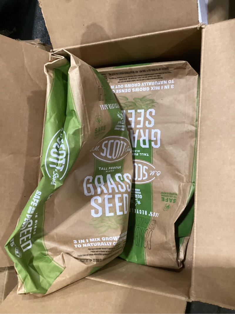 Condition photo showing As Is for o.m. scott & sons tall fescue blend grass seed, 8 lbs. (2-pack) | lawn seed, fertilizer and soil improver, naturally crowds out weeds 2 pack tall fescue