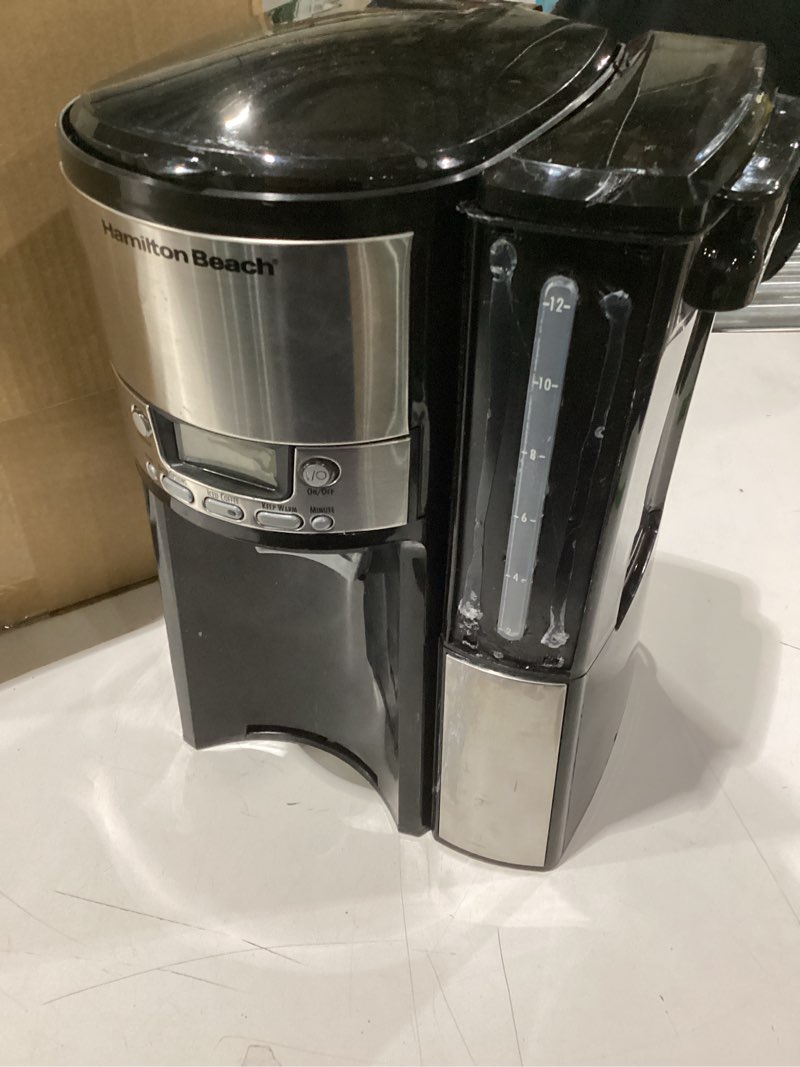 Condition photo showing As Is for Used Hamilton Beach One Press Programmable Dispensing 12 Cup Coffee Maker with Internal Coffee Pot, Stays Warm and Fresh for Hours, 60 oz. Removable Reservoir, Black & Stainless Steel (47950) Black and Silver