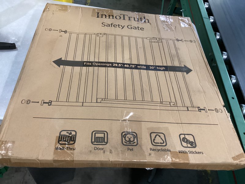 Condition photo showing New/Like New for innotruth 29.5–40.75" baby gate for stairs, 30" tall dog gates for doorways & hallways, safety gate for kids & pets, pressure-mounted walk-through with dual lock & 2-way swing, black black 29.5-40.75" w x 30" h