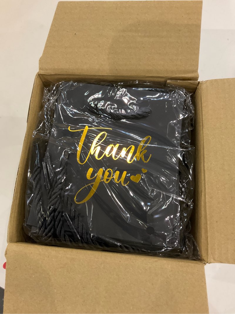 Condition photo showing New/Like New for Honoson 30 Pcs Mini Gift Bag with Handle 4 x 2.75 x 4.5'' Small Thank You Bag Foil Paper Tote for Wedding Baby Shower Birthday Graduation Thanksgiving Party Favor Supplies (Black/Gold) Black/ Gold
