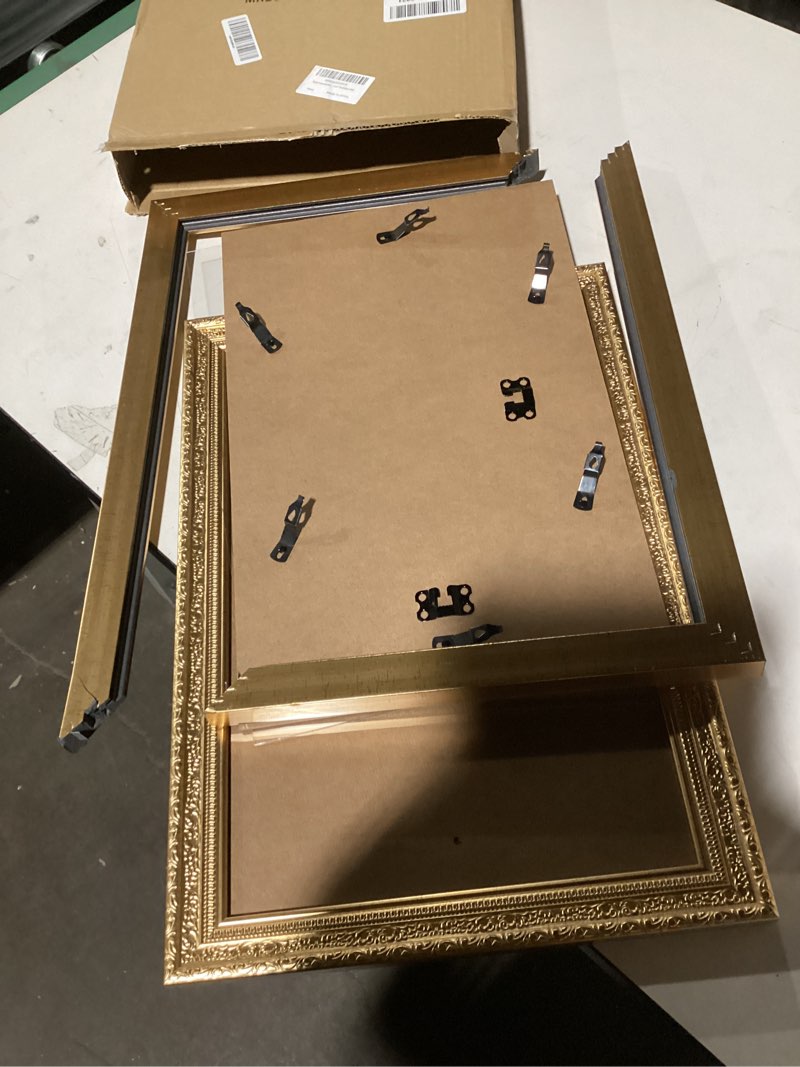 Condition photo showing As Is for Edenseelake 11x17 Picture Frames Set of 2, Vintage Gold 11 x 17 Poster Frame for Wall Hanging Vertical and Horizontal 11x17 inch Gold