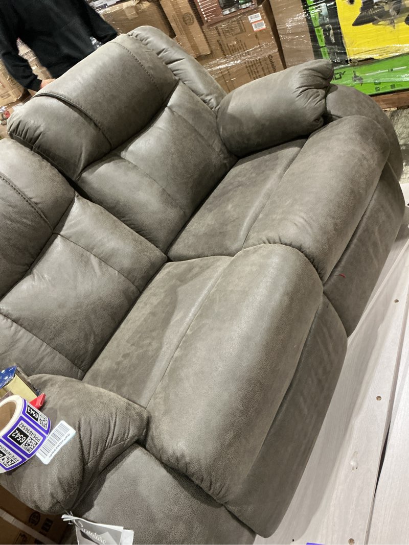 Condition photo showing As Is for signature design by ashley first base contemporary faux leather manual reclining loveseat, gray