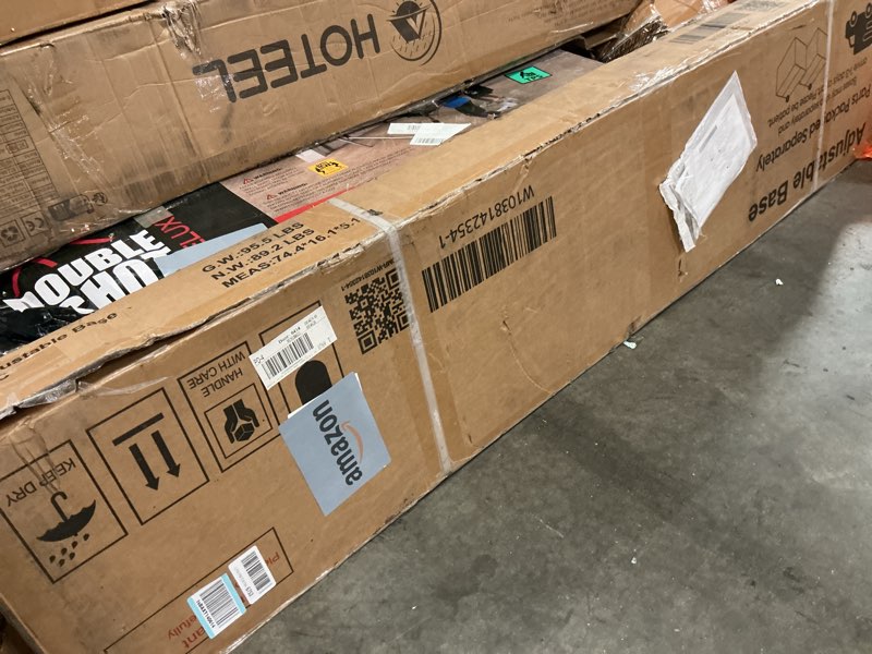 Condition photo showing As Is for (Incomplete) King Adjustable Bed Base Frame with Wireless Remot, Easy Installation, Heavy-Duty Steel Frame, Whisper-Quiet Motor, Head & Foot Lift, Zero Gravity & Anti-Snore Modes Comfort (79\" L x 74\" W x 12.72\" H) Black King Bed frame with protective cover