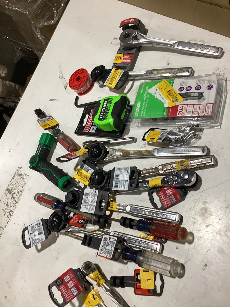 Condition photo showing Good Condition for assorted repair kit lot: tools, measuring tape, dual function cafi and gfi, etc
