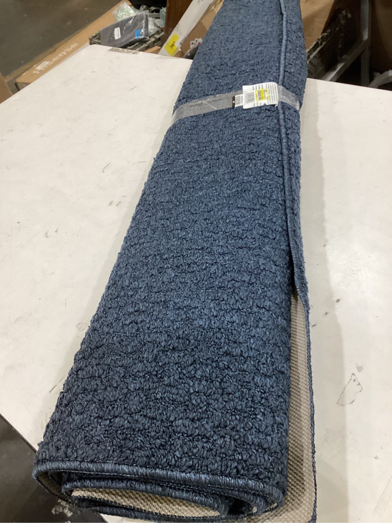 Condition photo showing As Is for 4'x5'6" washable solid machine tufted accent rug blue - threshold™: skid-resistant, low pile, indoor use