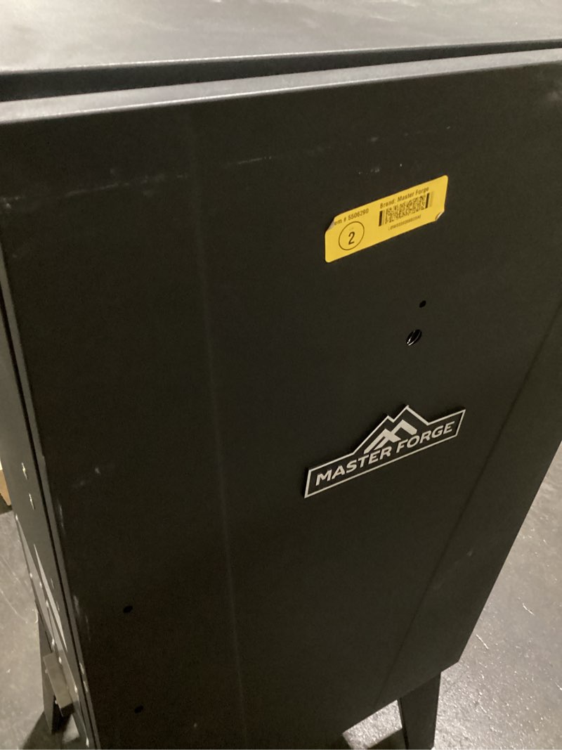 Condition photo showing As Is for master forge 531-sq. in black electric smoker