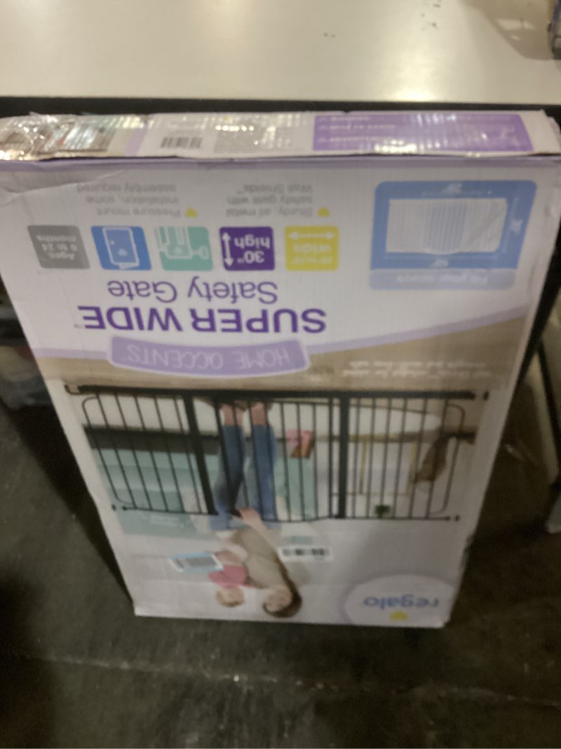 Condition photo showing As Is for Regalo 58-Inch Easy Step Extra Tall Arched Décor Walk Thru Baby Gate, Award Winning Brand, Includes 4-Inch Extension Kit, 4 Pack Pressure Mount Kit and 4 Pack Wall Mount Kit, Bronze Black - 29-58"w X 30"h