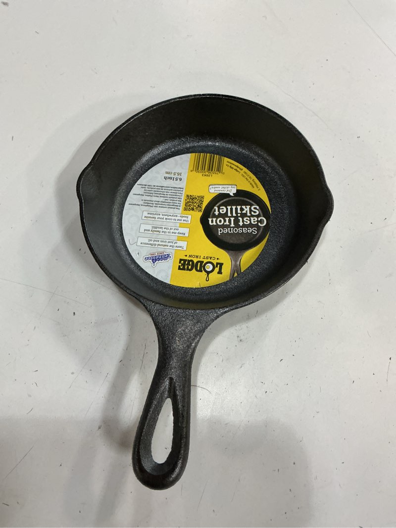Condition photo showing Good Condition for lodge 6.5 inch cast iron skillet. extra small cast iron skillet for stovetop, oven, or camp cooking