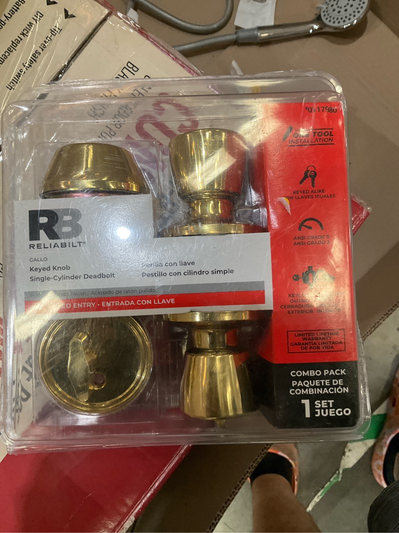 Condition photo showing As Is for reliabilt gallo polished brass exterior single-cylinder deadbolt keyed entry door knob combo pack