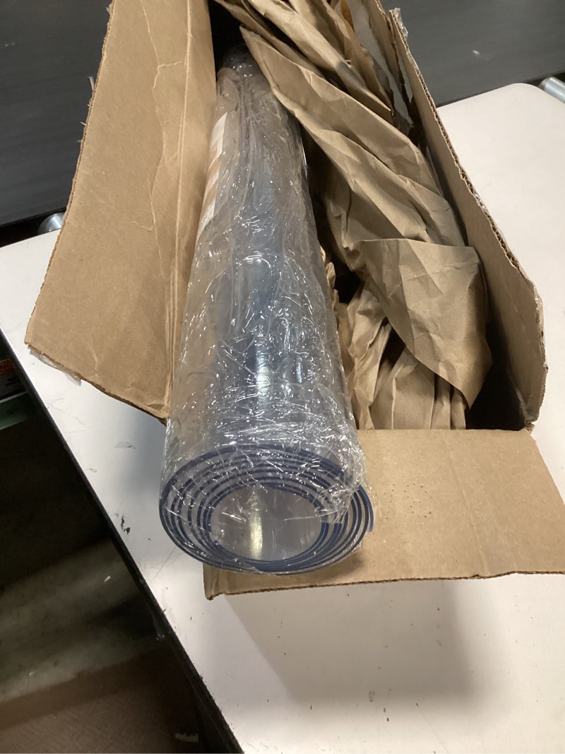Condition photo showing Good Condition for royhom clear table protector 30 x 60 inch - 1.5mm thick plastic table cover, clear table cover protector rectangle, waterproof pvc desk mat for coffee table, writing desk, dining room, dresser 30" x 60" (rectangular) clear 1.5mm
