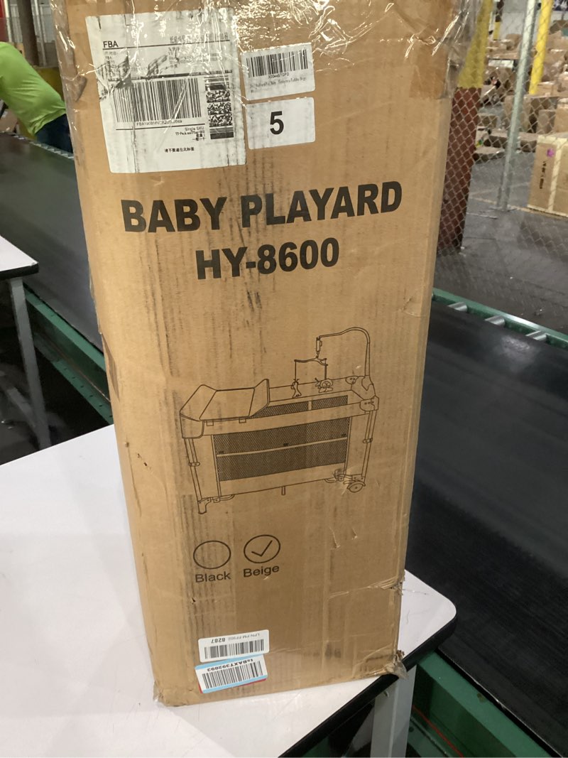 Condition photo showing As Is for 5 in 1 Pack and Play, Baby Bassinet Bedside Sleeper, Baby Playard, Bedside Crib with Changing Table, Foldable Travel Playard for Newborn to Toddles (Beige)