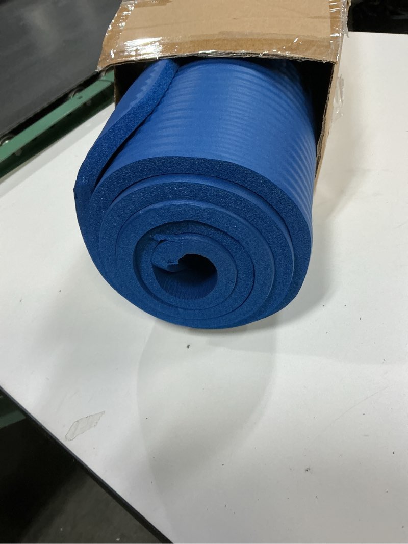 Condition photo showing Good Condition for Amazon Basics Extra Thick Exercise Yoga Mat with Carrying Strap Blue 1/2 Inch