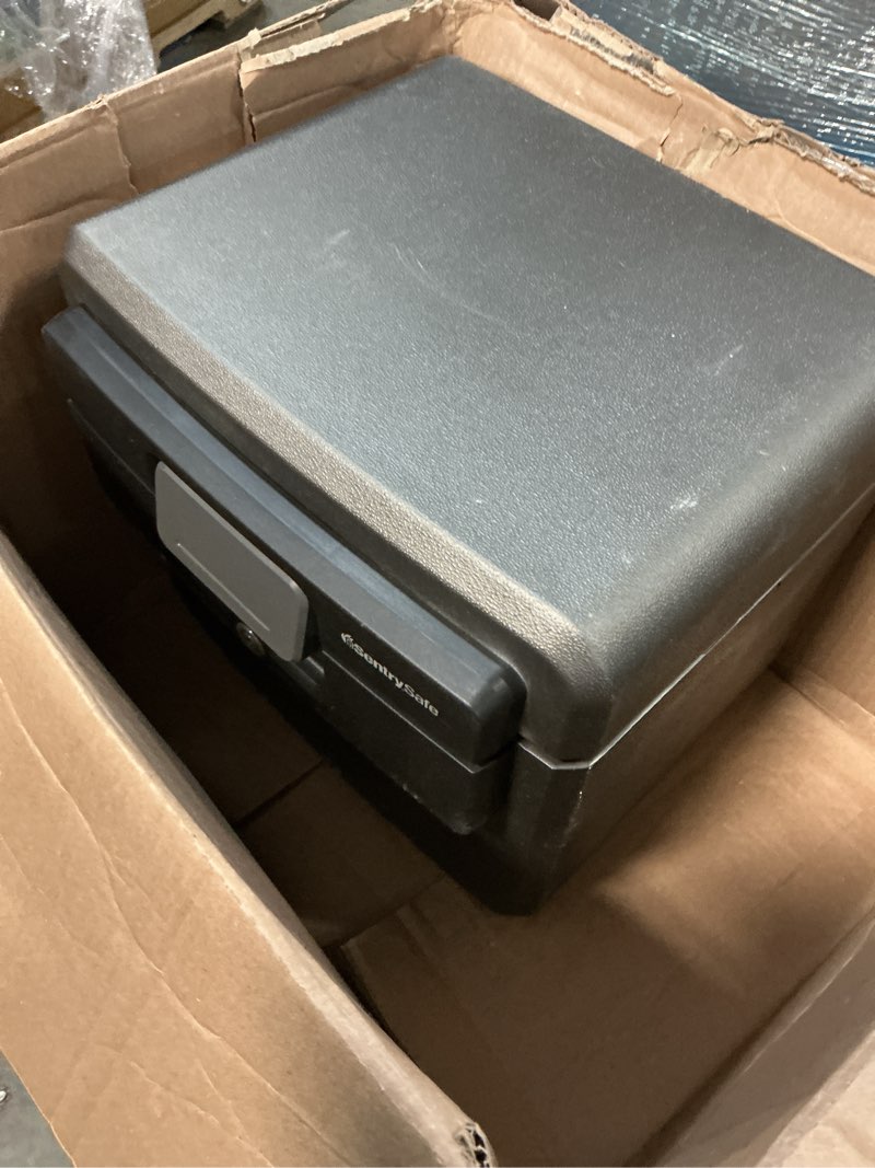 Condition photo showing As Is for sentrysafe hd4100 fire-resistant and water-resistant box safe with key lock, 0.65 cu. ft.