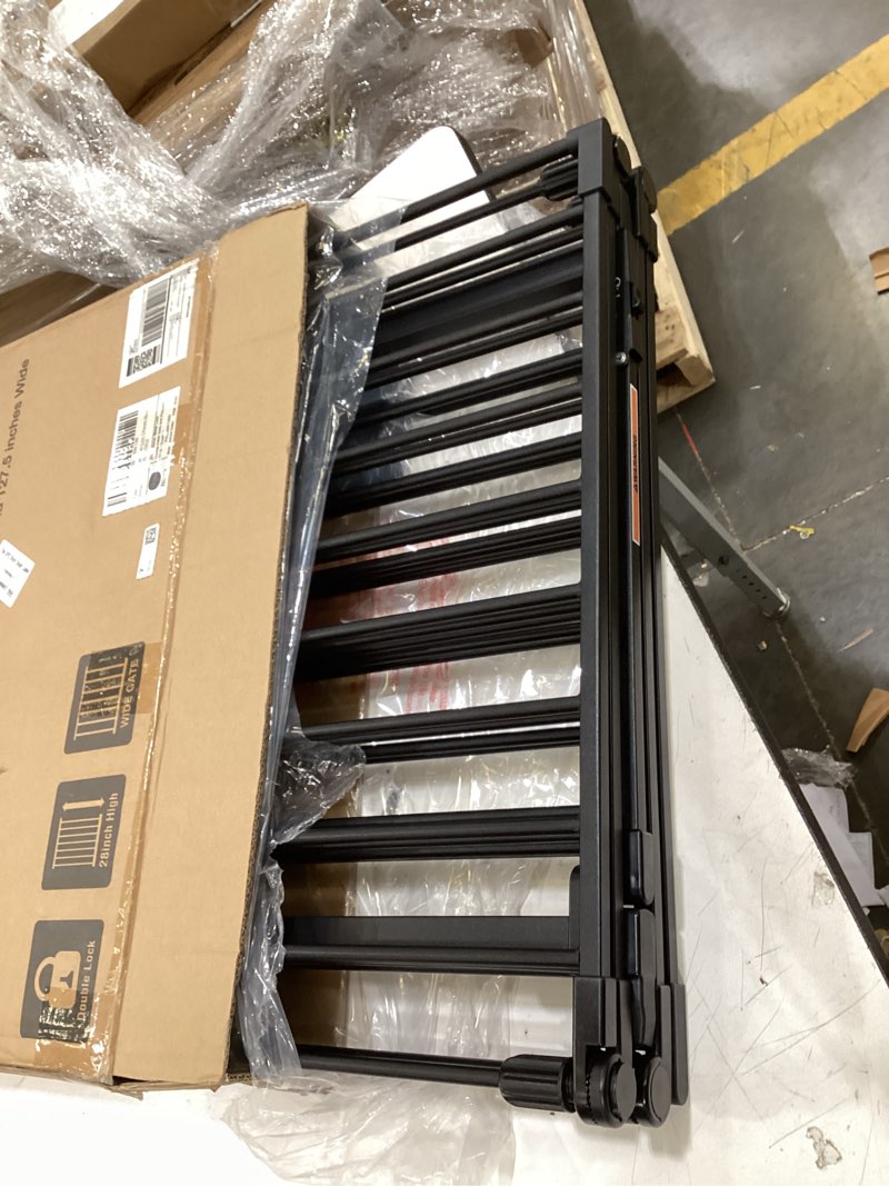 Condition photo showing New/Like New for 127.5" extra wide baby gate for fireplace christmas tree, configurable 5 metal panels baby fence, child gate for wide openings with anti-trip pedal, long kid gate for dog pet, 28'' tall black black 127.5" wide