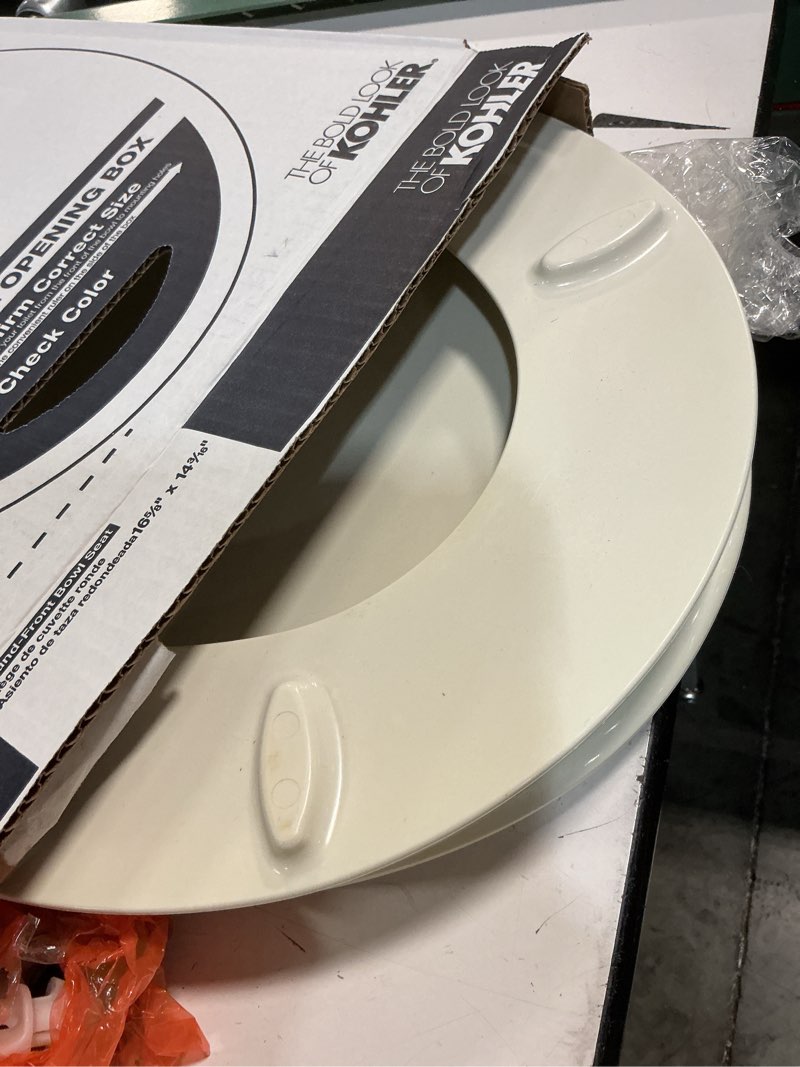 Condition photo showing As Is for kohler k-4775-96 brevia round toilet seat with quick-release hinges and quick-attach hardware for easy clean, biscuit round biscuit
