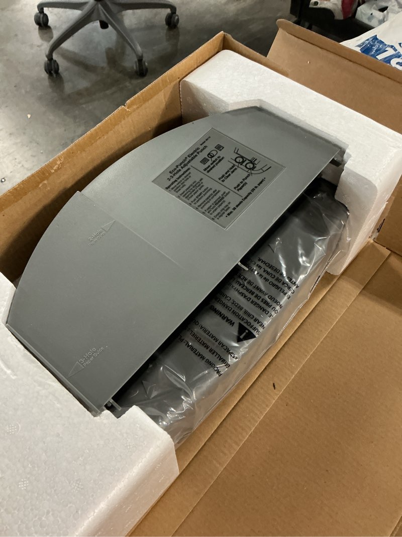 Condition photo showing New/Like New for officemate eco-punch, electric, 2-3 hole, 30 sheet capacity