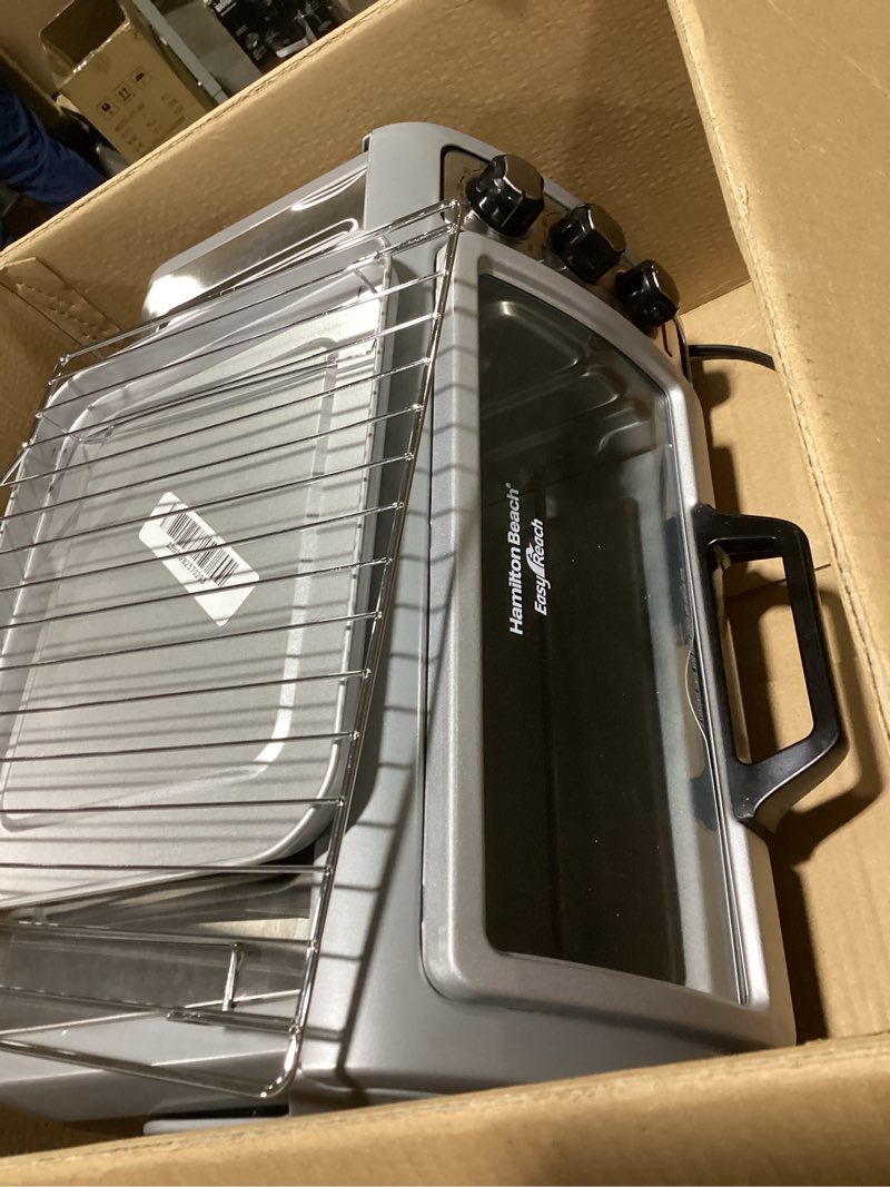 Condition photo showing Good Condition for Hamilton Beach 6 Slice Countertop Toaster Oven With Easy Reach Roll-Top Door, Bake, Broil & Toast Functions, Auto Shutoff, Silver (31127D)
