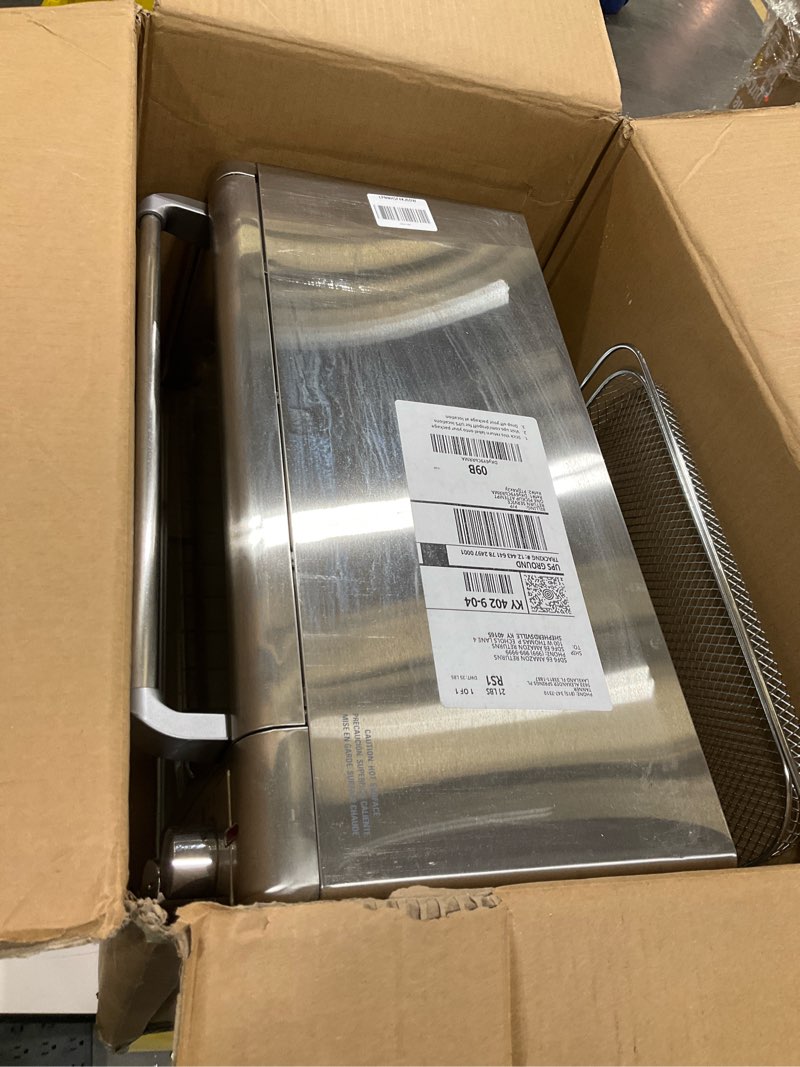 Condition photo showing As Is for BLACK+DECKER Crisp 'N Bake Air Fry Countertop Convection Toaster Oven, XL Capacity, 8-Slice, 5-in-1, Fits 9” x 13” pan,12” Pizza, 60-Min Timer, Bake, Broil, Air Fry, Toast, Keep Warm, Stainless Steel