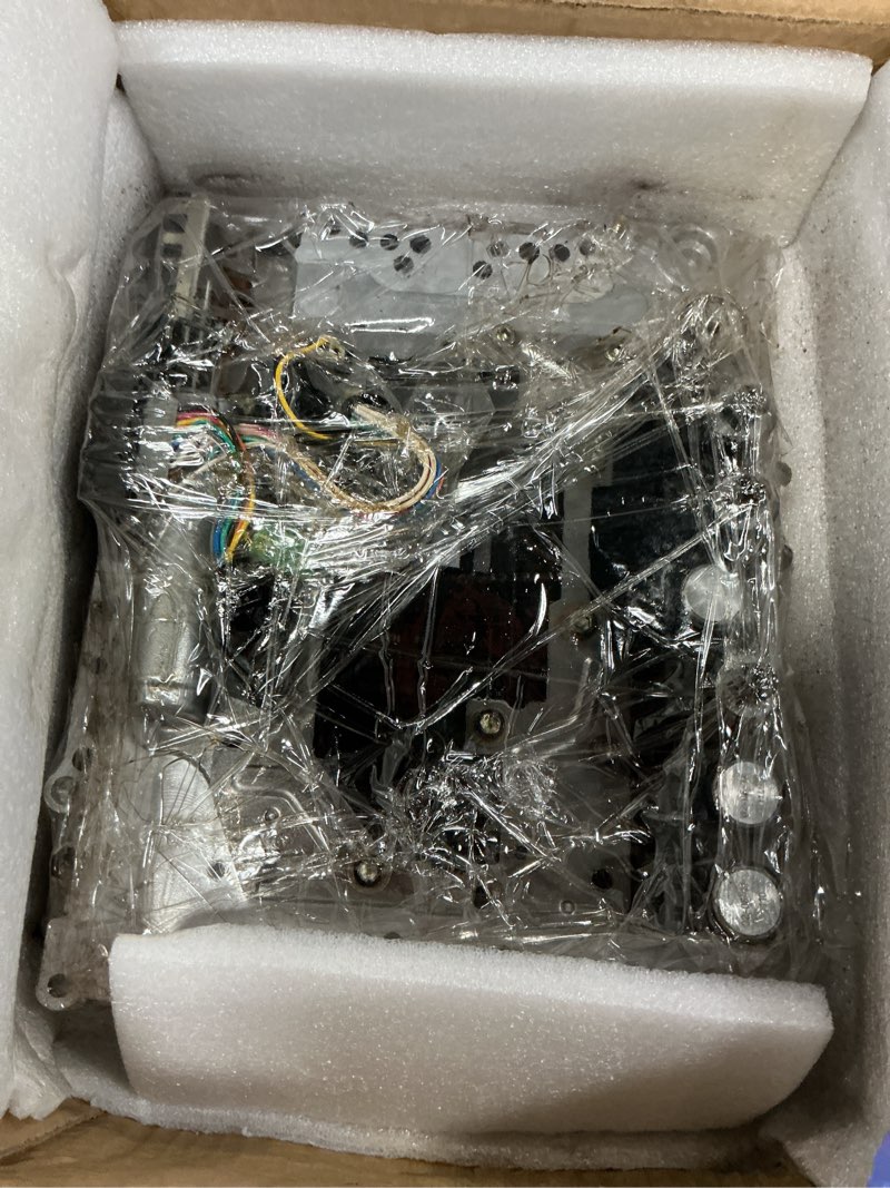 Condition photo showing As Is for refurbished tcu transmission valve body compatible with nissan xterra pathfinder armada frontier titan fx35 g35 re5r05a