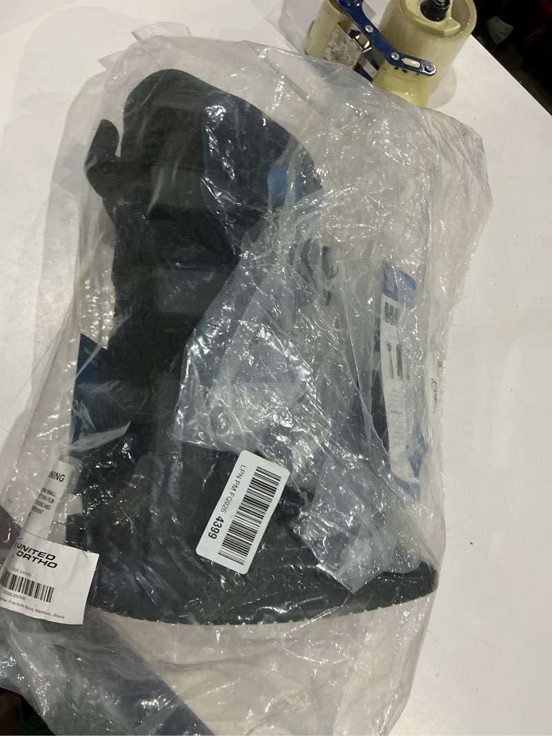 Condition photo showing New/Like New for united ortho cam walker fracture boot, medium, black black medium