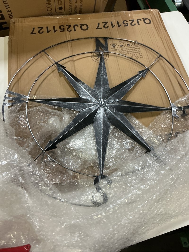 Condition photo showing Good Condition for aboxoo round metal compass decorative compass metal wall art hanging wall sculpture 22.8 inch black diameter farmhouse decor indoor or outdoor sign 22.8"l x 22.8"w black