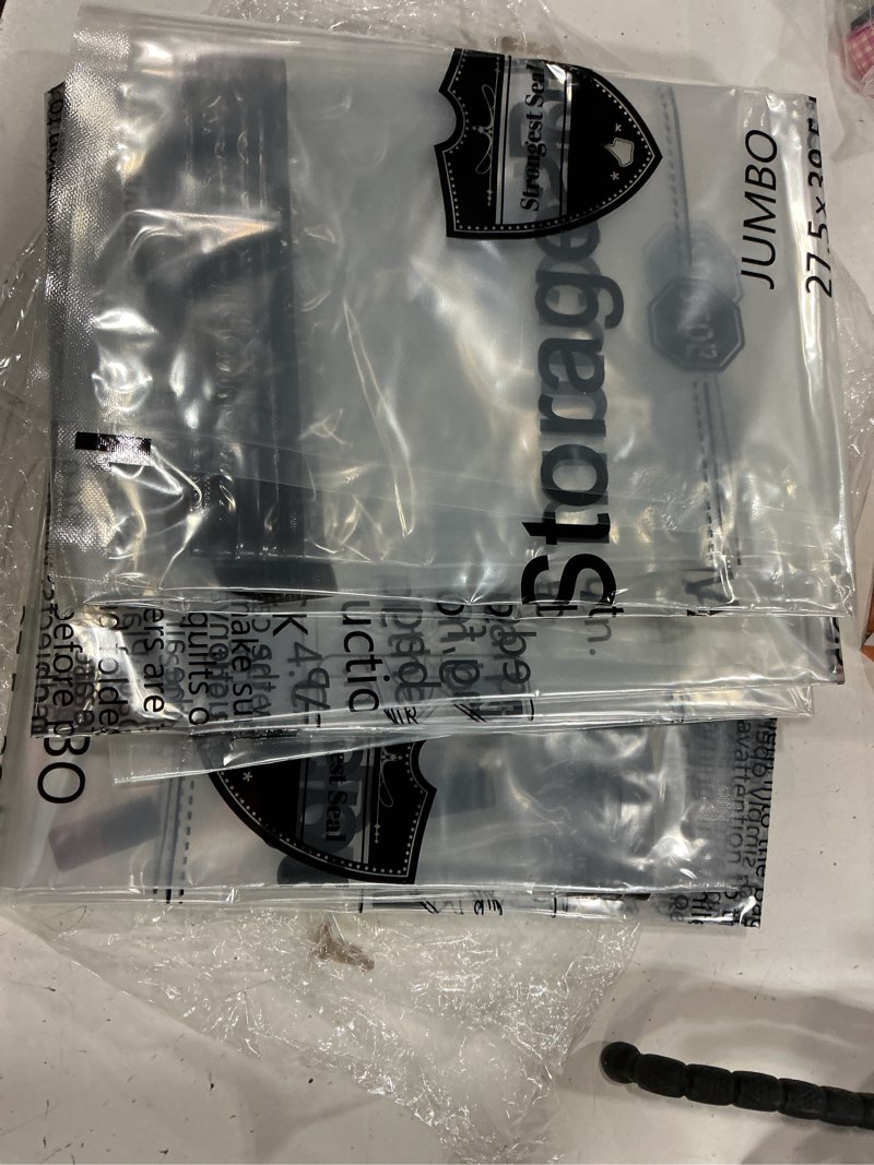 Condition photo showing As Is for gongshi vacuum storage bags, space saver seal bags for clothing, travel luggage,blankets, comforters, pillows, clothes storage.10 jumbo