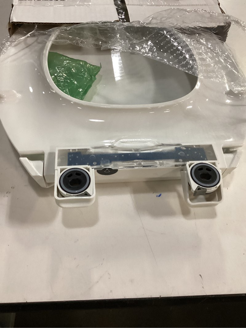 Condition photo showing Good Condition for kohler 24764-rl-0 rutledge nightlight readylatch slow close toilet seat, elongated, quiet-close lid and seat, grip-tight bumpers, white elongated white nightlight
