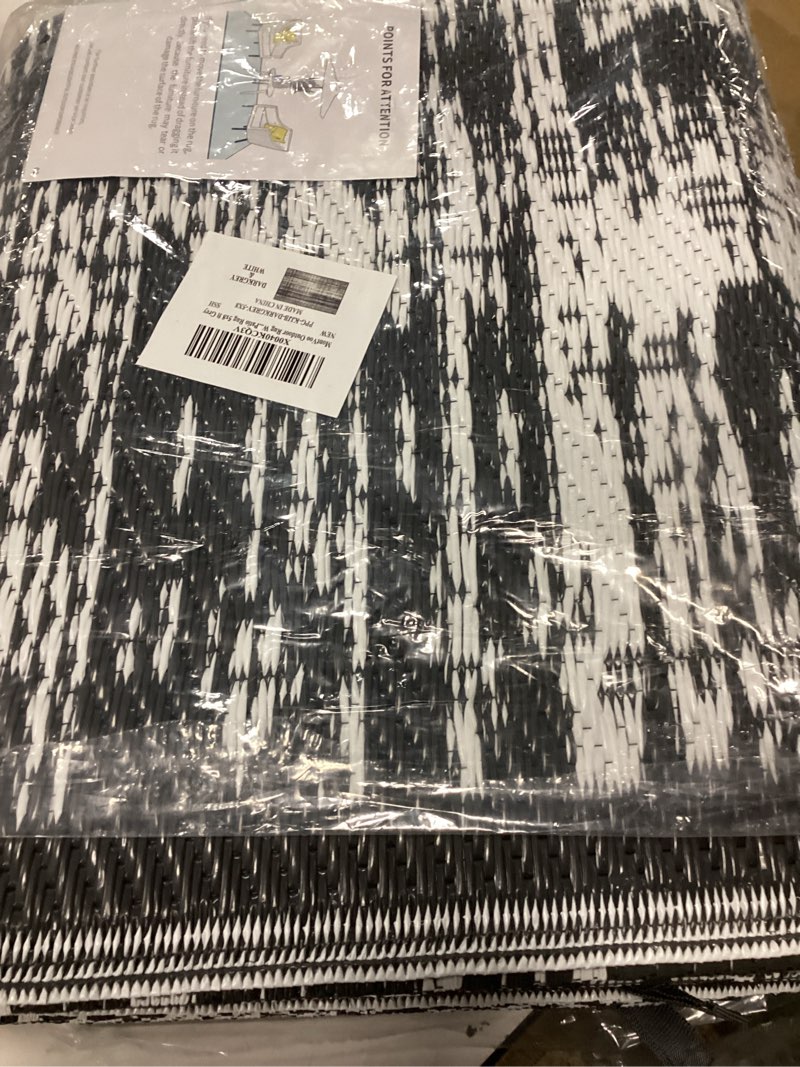Condition photo showing New/Like New for montvoo outdoor rug waterproof 5x8 ft outdoor carpet patio rug mat reversible rv camping rug plastic straw outside rug for balcony porch deck picnic beach modern grey grey 5' x 8' (rectangular)