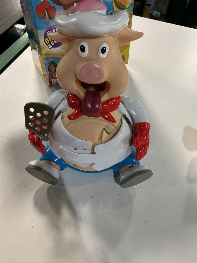 Condition photo showing As Is for Goliath Pop The Pig - Bigger & Better - Belly-Busting Fun as You Feed Him Burgers and Watch His Belly Grow, Multi Color Pop the Pig Game - Bigger & Better