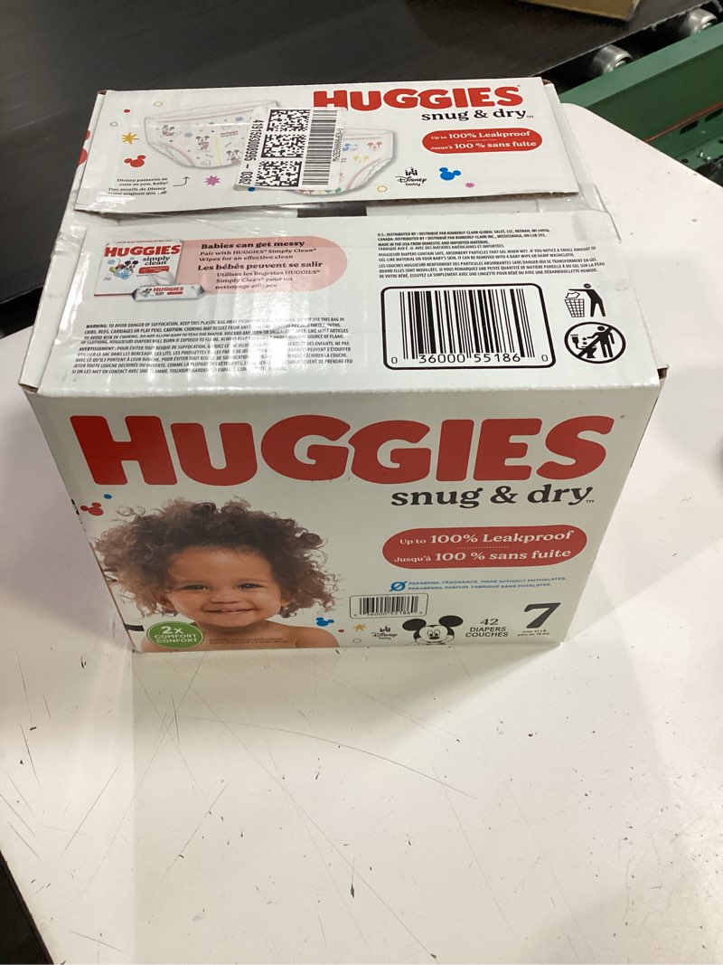 Condition photo showing New/Like New for huggies size 7 diapers, snug & dry baby diapers, size 7 (41+ lbs), 42 count, packaging may vary