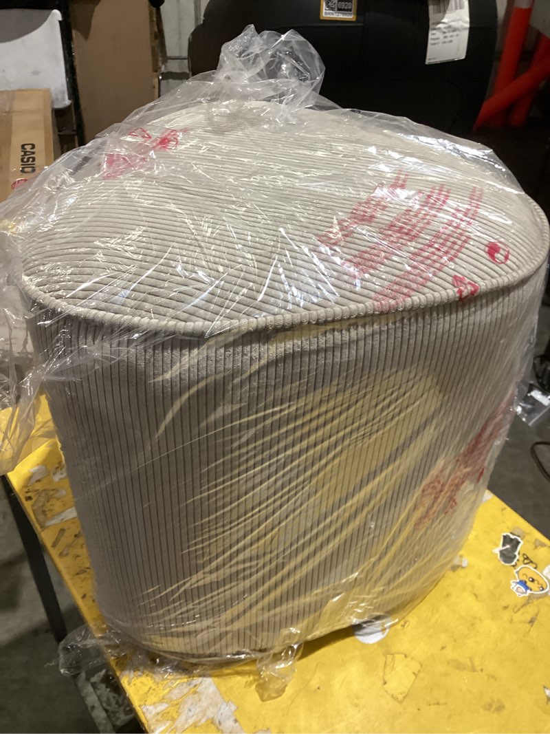 Condition photo showing As Is for triangular shaped upholstered corduroy ottoman beige - room essentials™
