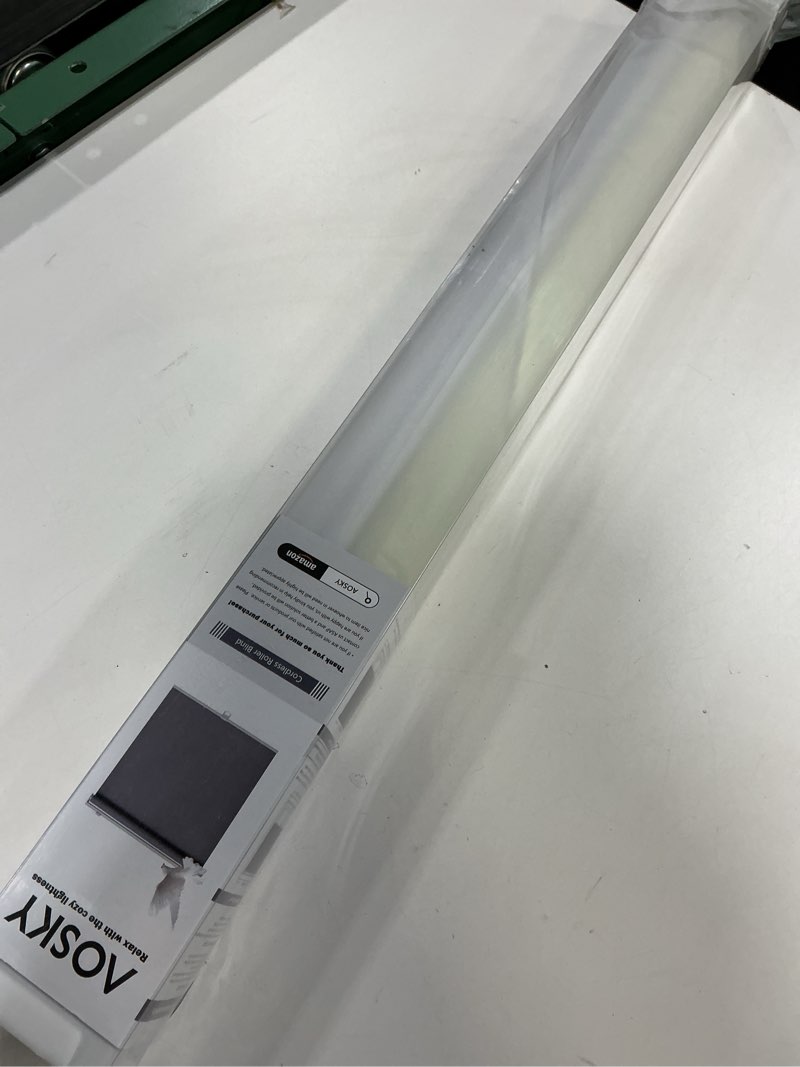 Condition photo showing As Is for Cordless Roller Shades Blackout Blinds for Windows Room Darkening Rolled Up Shades with Spring System, UV Protection Window Shades Door Blinds for Home and Office (22" W x 72" H, Ivory) 22"W x 72"H Ivory